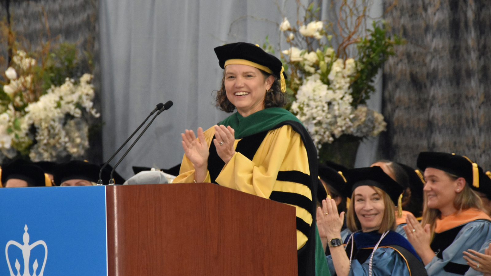 Dean Armstrong speaking at podium