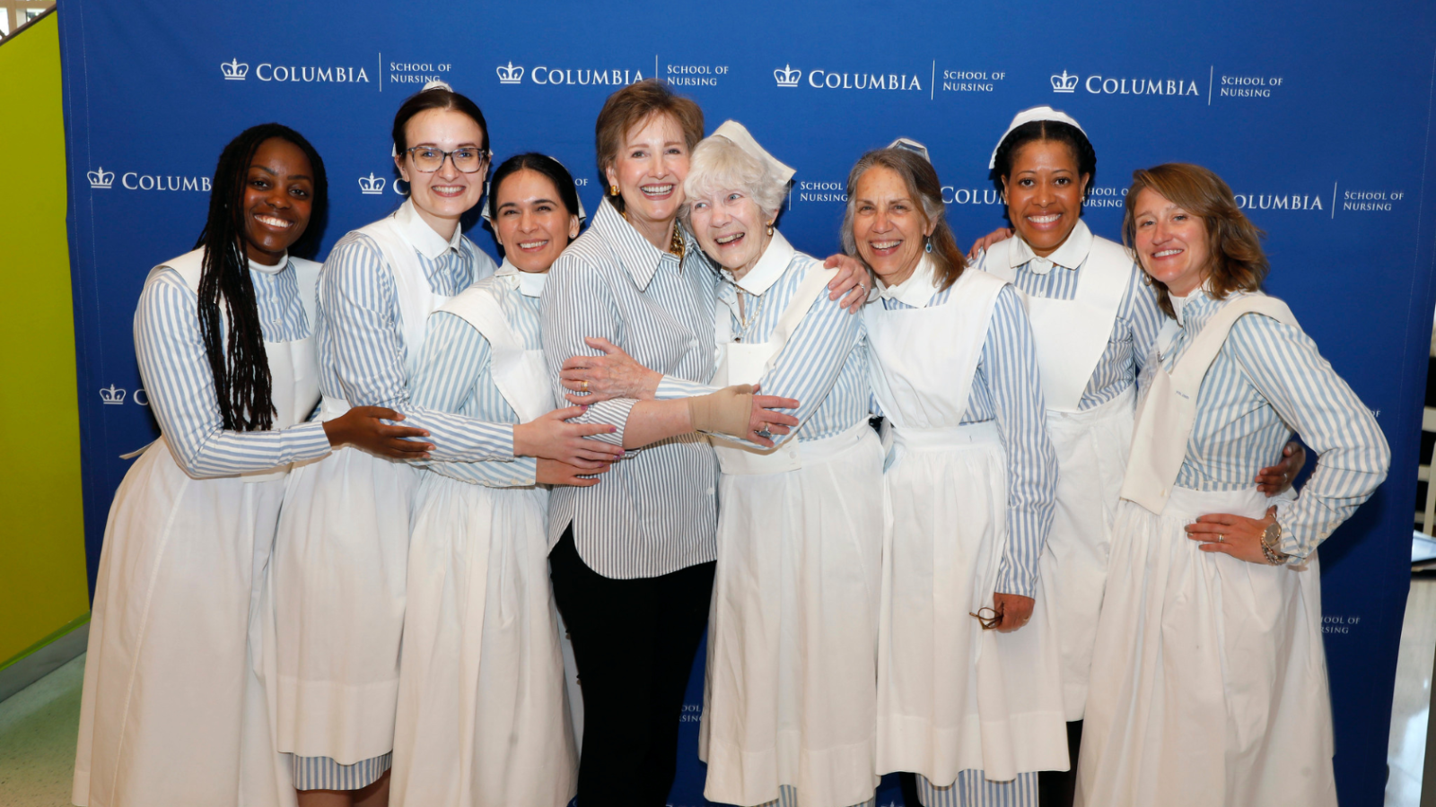 Columbia Nursing faculty and alumni wearing vintage nursing uniforms