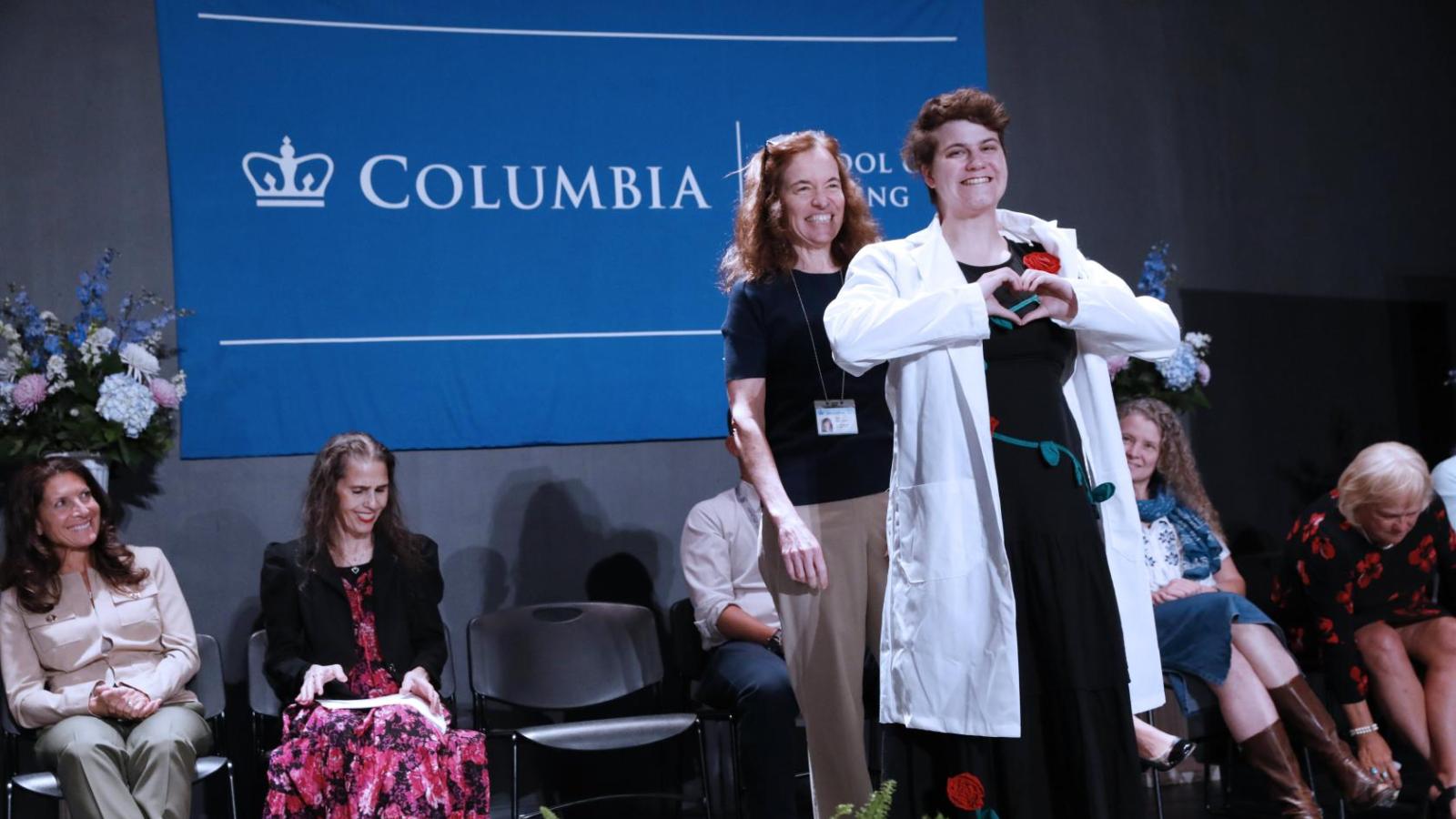 Student receiving their coat at White Coat Ceremony 2024
