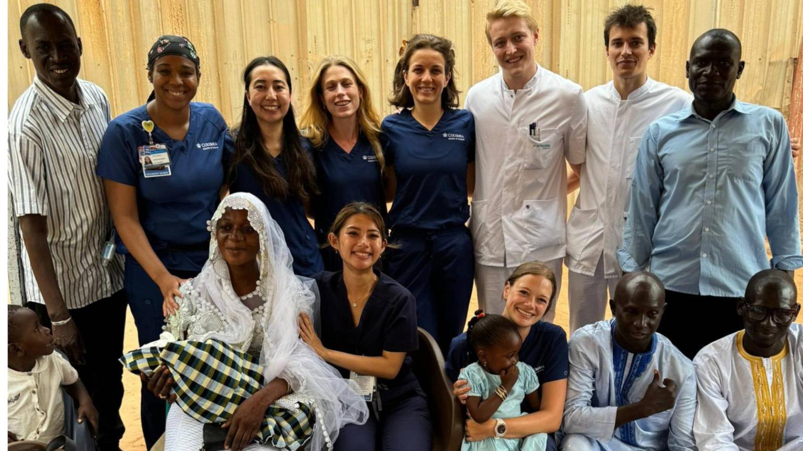 Group photo with members from families from the local community