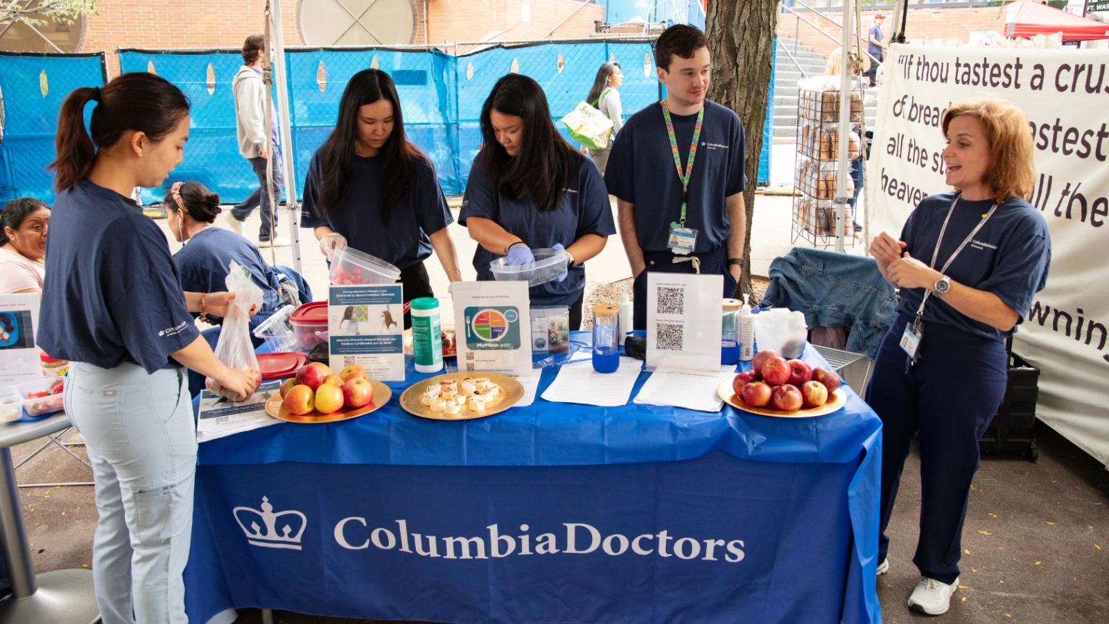 Outdoor table at local farmers market by the ColumbiaDoctors Nurse Practitioner Group