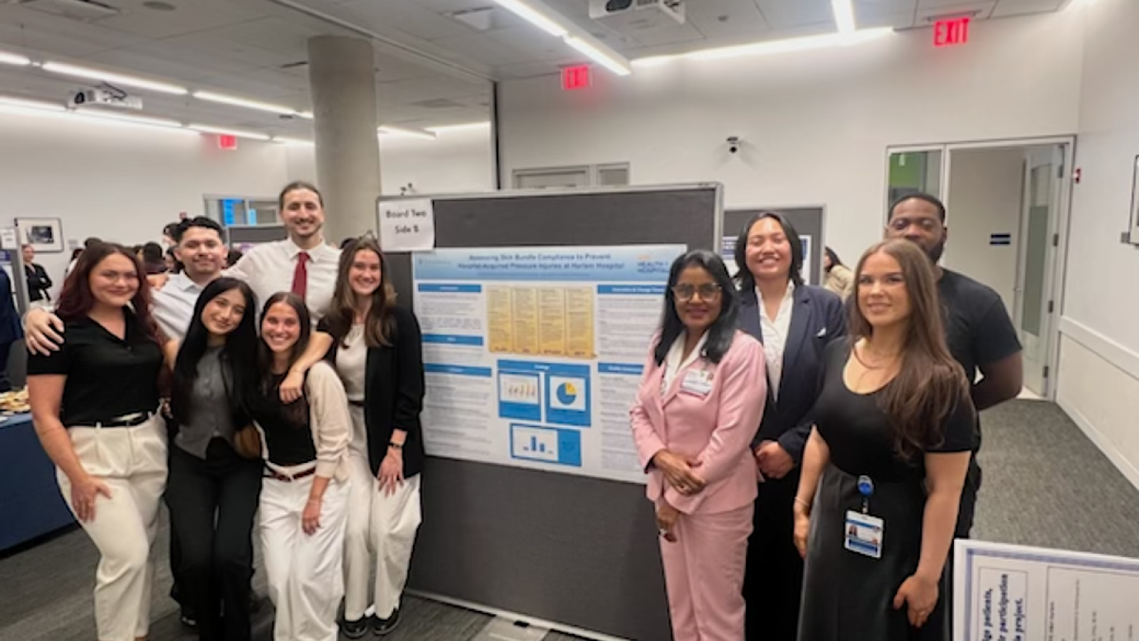 Students post at 2025 QI poster session