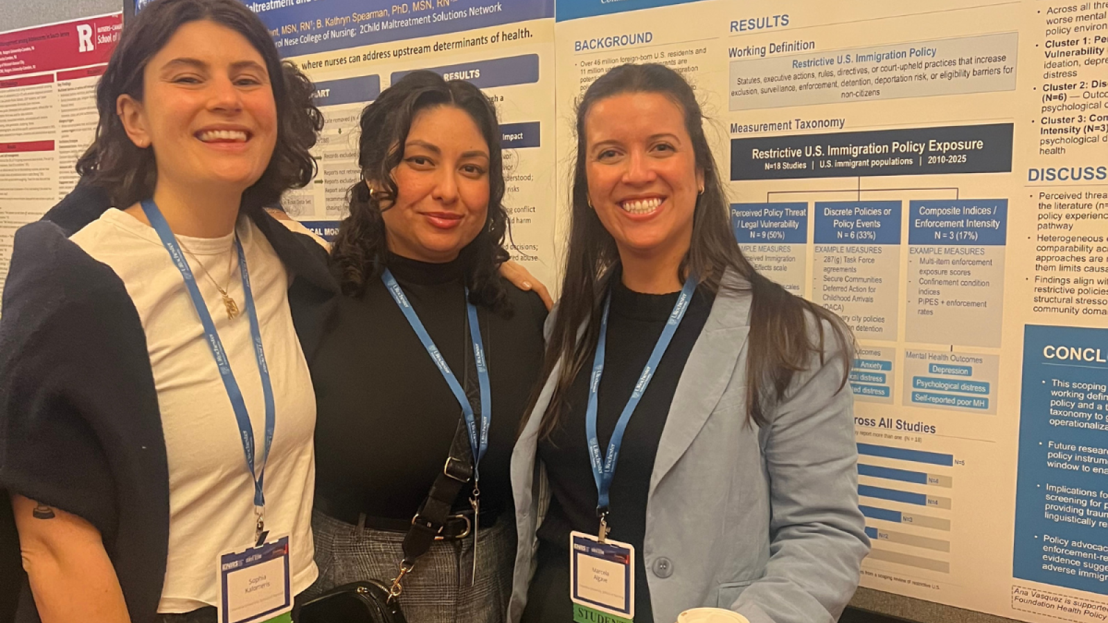 Three Columbia Nursing researchers pose with their poster presentation