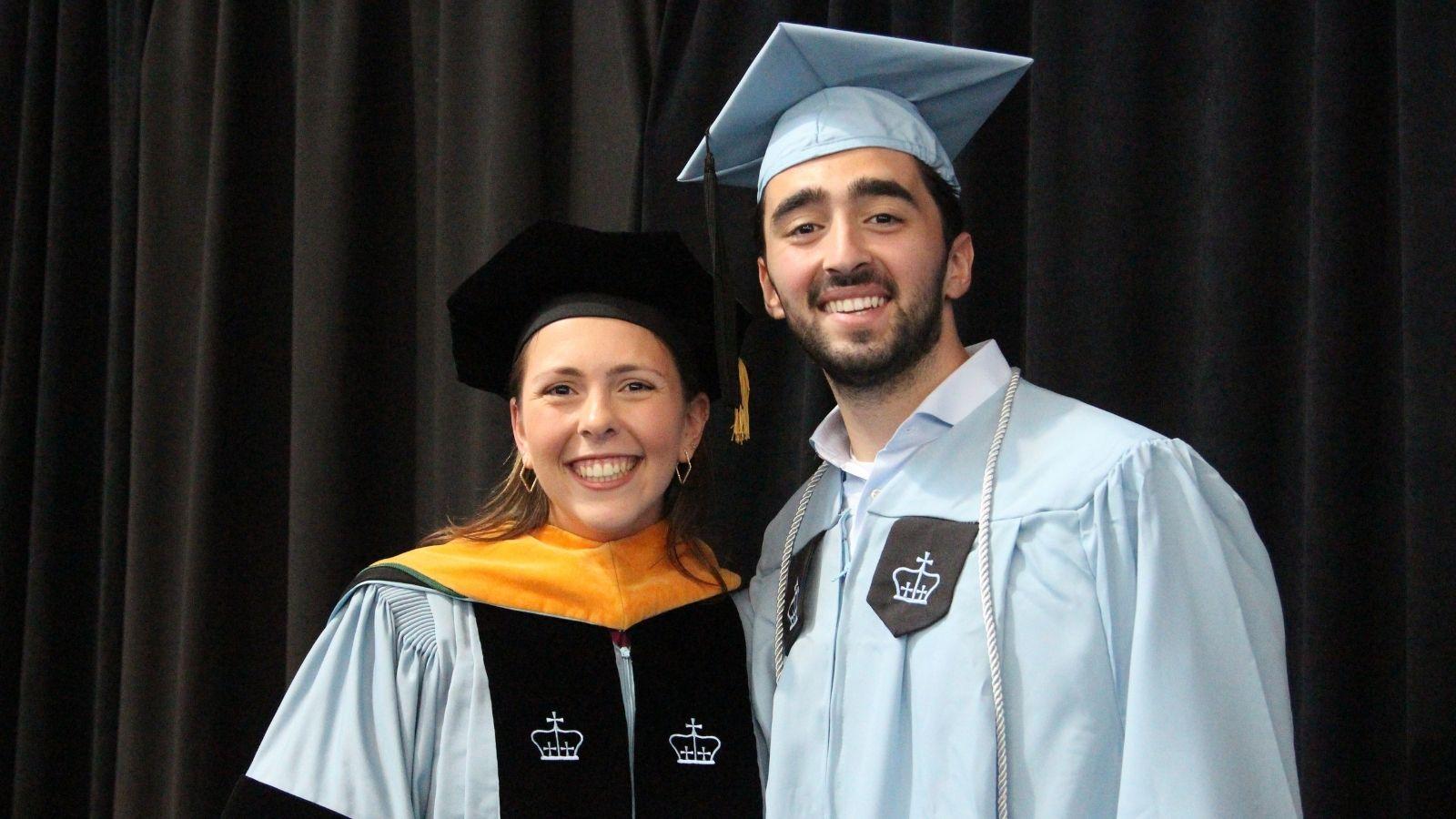 A Columbia Nursing DNP graduate and MDE graduate smile together