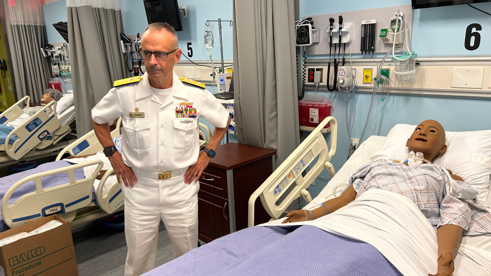 Navy member touring Simulation Center