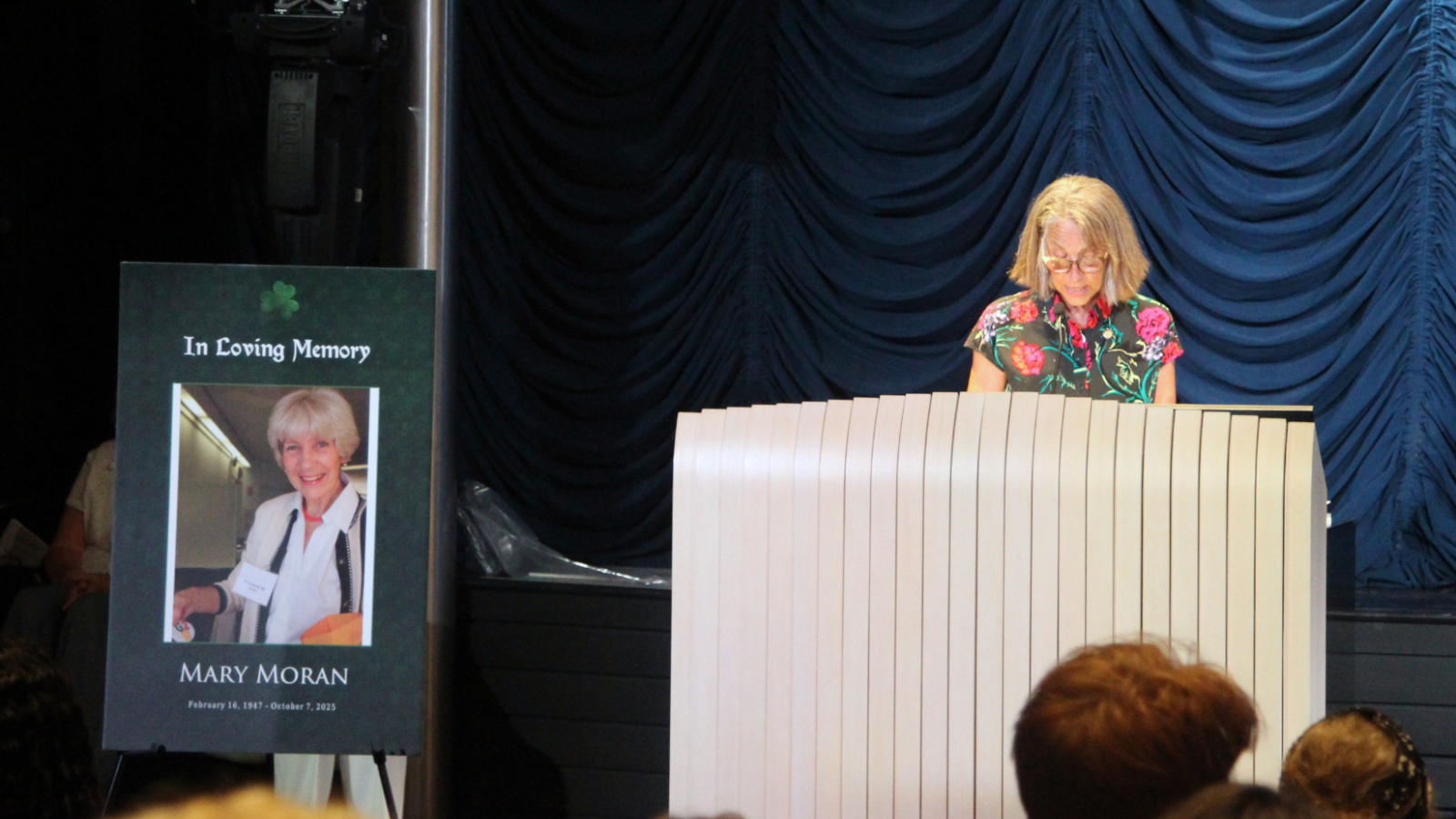 Faculty member speaking at the Pinning Ceremony