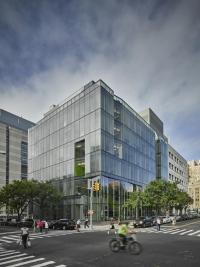 Glass School of Nursing building on a sunny summer day.