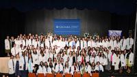 DNP students pose for a group photo at 2026 White Coat Ceremony
