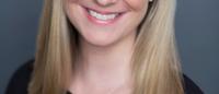 Headshot of blond female assistant professor, Sarah Collins.