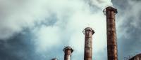 Factory chimney and smoke stock image.