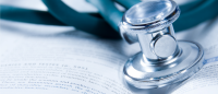 stethoscope laid over a book