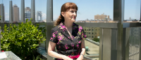 Dean Emerita Bobbie Berkowitz standing on Columbia Nursing's rooftop terrace.
