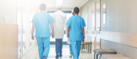 Nurses walking in hall.