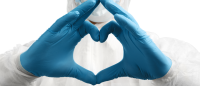 Frontline worker gesturing a heart symbol