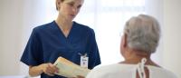 Nurse meets with patient