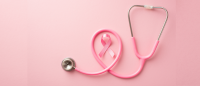 Pink Ribbon and pink stethoscope recognizing Breast Cancer Awareness Month