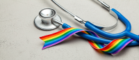 Stethoscope wrapped up in rainbow flag