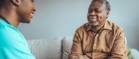 Older black male patient with a clinician