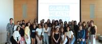 Students pose with Dean Lorraine Frazier at the 2026 Global Celebration