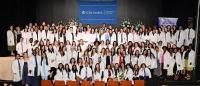DNP students pose for a group photo at 2026 White Coat Ceremony