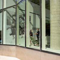 View looking in to Columbia Nursing building through glass windows.